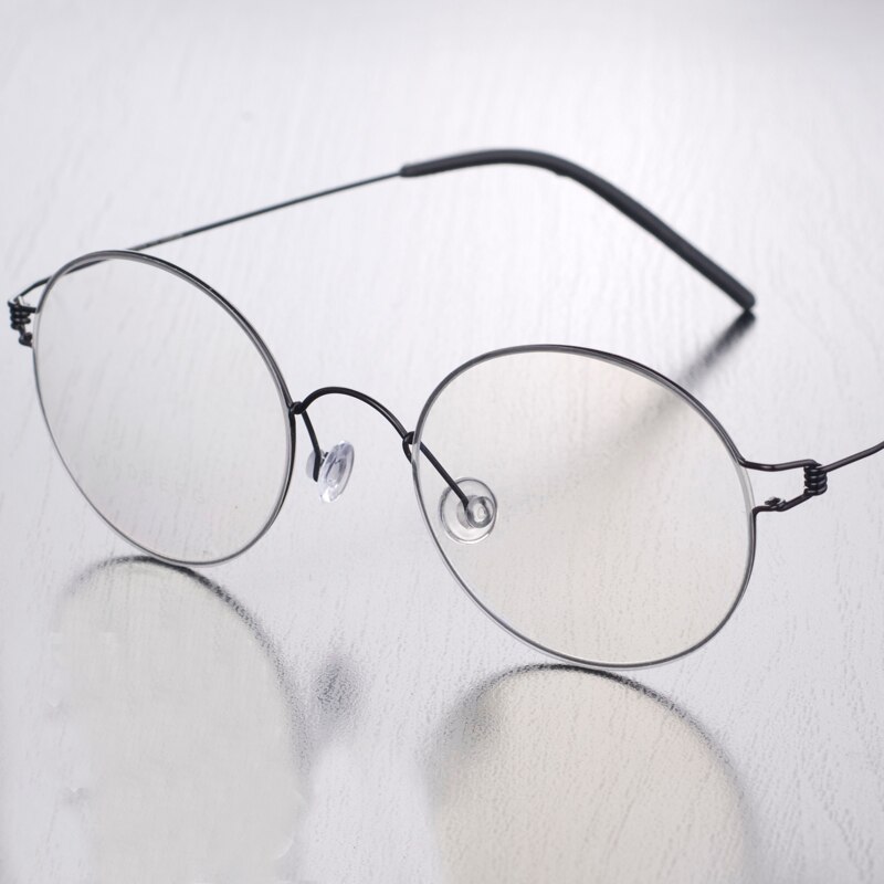 Ren titanium uden skrue letvægtsbriller mænd kvinder optiske briller retro rund brillestel med silikone næsepuder