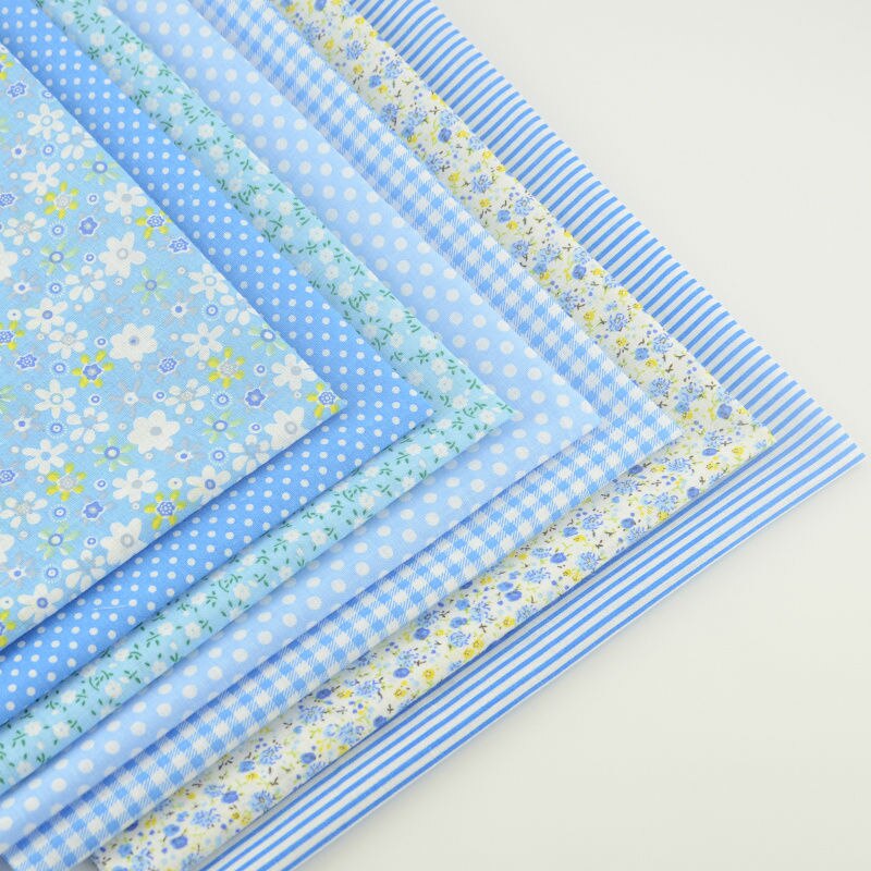 Boekenweef katoenen stof lichtblauwe kleur diverse fat quarter kussen quilten meter naaien textiel weefsel patchwork gordijn