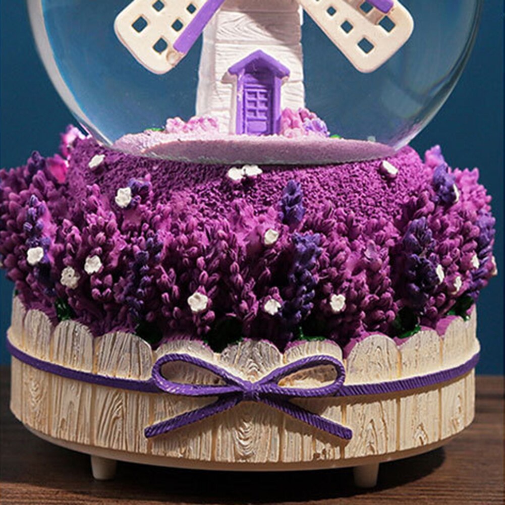Nieve cayendo nieve caja de música de molino de viento caja de música con forma de bola de cristal con púrpura lavanda Base de escritorio decoración