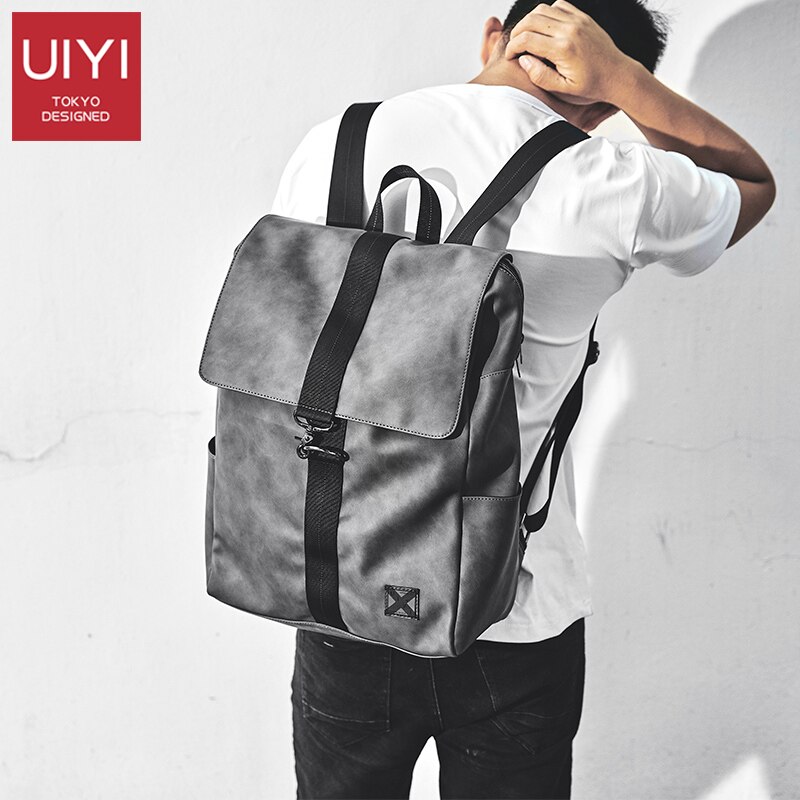 UIYI mochila dos homens Coreano couro PU + PVC 14 polegada laptop escola mochila grande capacidade à prova d' água anti-roubo bolsa de viagem saco