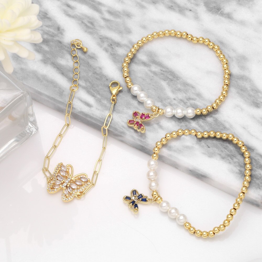 Flola Koper Zirkoon Vlinder Armbanden Voor Vrouwen Gouden Kralen Ketting Elastische Touw Parel Armband Crystal Sieraden Brtf64