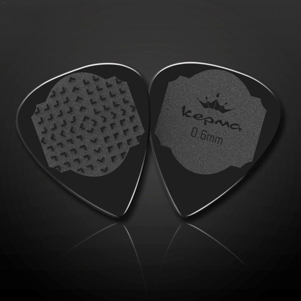 Púa de Guitarra antideslizante, 5 uds., mediador de nailon blanco y negro para Guitarra eléctrica acústica, ukelele de 0,6 MM, accesorios