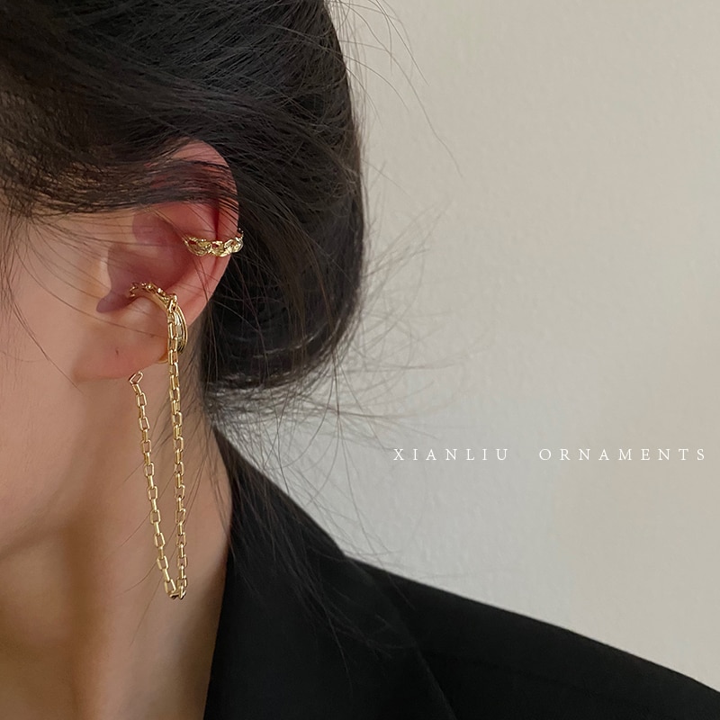 Huanzhi simpel guld metal asymmetri lang kvast ingen piercing øre manchet krystal krog klip øreringe til kvinder smykker
