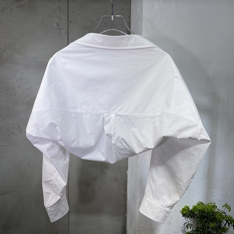 Camiseta blanca informal Irregular TWOTWINSTYLE para mujer, Blusa de manga larga con cuello de solapa, ropa de de verano para mujer, novedad