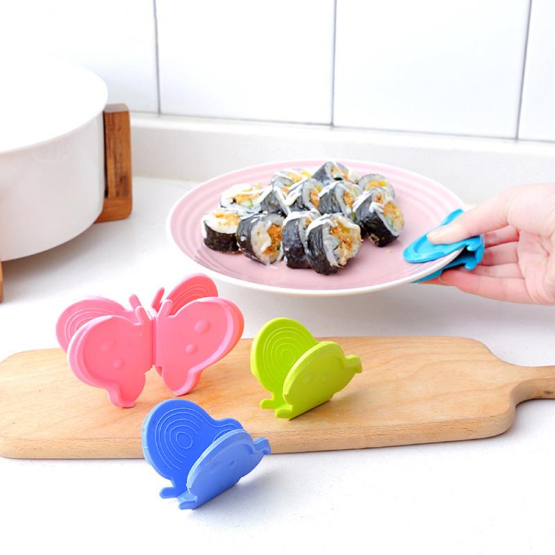 Papillon cuisine isolation thermique pince outils 4 pièces utile Silicone résistant à la chaleur isolation four à micro-ondes plat pince support à pince