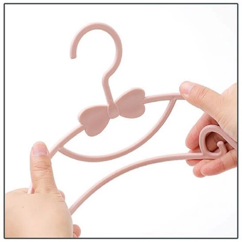 Perchero portátil de plástico para ropa de niños, organizador de ropa de bebé, a prueba de viento, 10 Uds.
