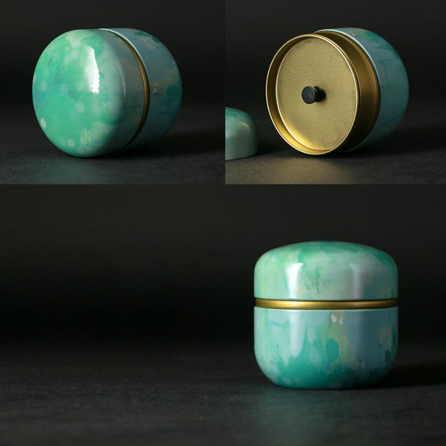Lata de té de metal de alta gama, creativa, japonesa, pequeña, redonda, portátil, para viaje, caja de embalaje, caja de hierro