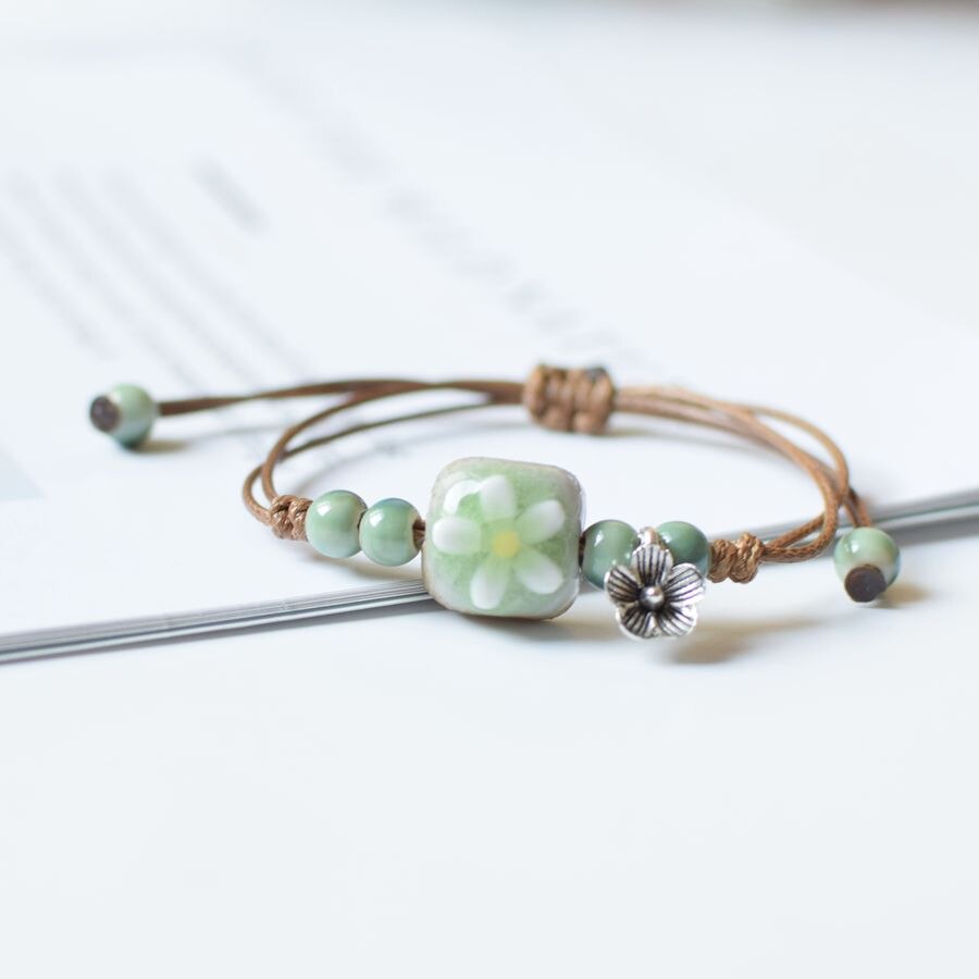 Flerlags koreansk klokke nylon reb porcelæn perle armbånd søde smykker tilbehør til studerende og teenagere til kvinder: 12