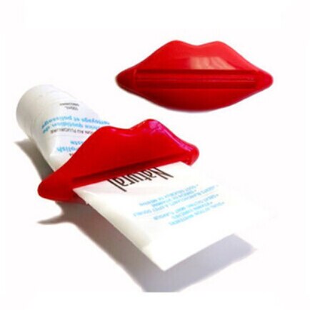 2 stk/parti røde læber klemme enhed til at presse tandpasta ud også for lotion og kosmetik undgå spild