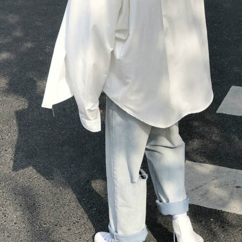 Męskie jeansy dzikie nogawki do kostek cienkie proste workowate spodnie rekreacyjne z dziurami spodnie jeansowe męskie wszystkie mecze stylowe Streetwear