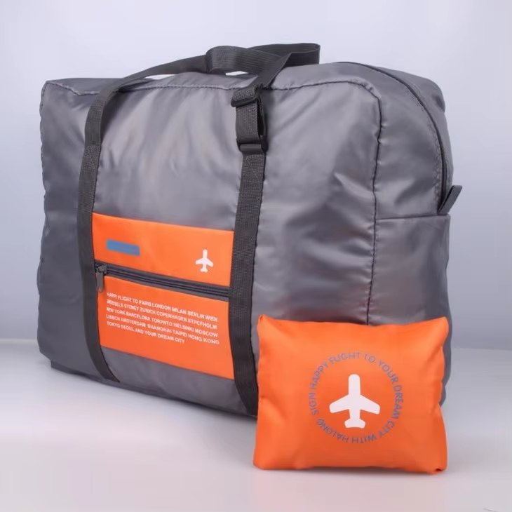 Nueva bolsa de equipaje de viaje impermeable plegable, bolsa de almacenamiento de equipaje de gran capacidad, bolso de viaje para equipaje de embarque, adecuado para bu: Naranja