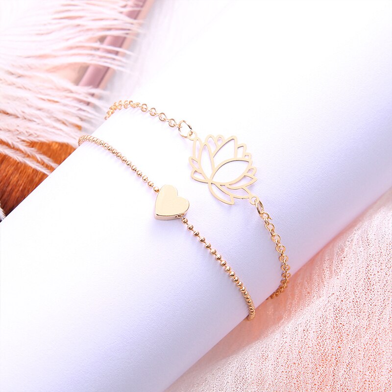 2 unids/set Simple ahueca hacia fuera Lotus pulseras encantadoras mujeres de oro en forma de corazón pulsera de cadena romántico de joyas de