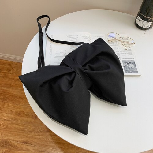 Geräumige damen-umhängetasche, schlichte einfarbige schleifen-schultertasche, Jahrgang-damen-freizeittasche.: Schwarzl