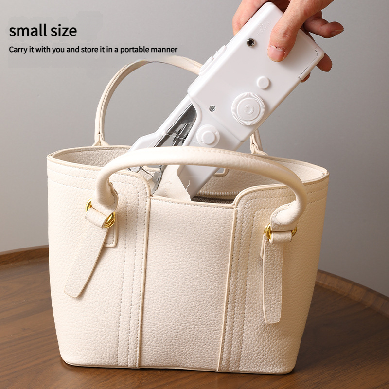 Håndholdt bærbar symaskin / mini elektrisk symaskin / lommesymaskin, egnet for sying, reparasjon og produksjon