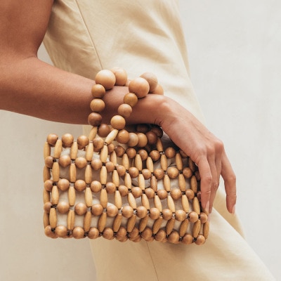 Bolso de mano hecho a la con cuentas, bolso de playa Estilo de vacaciones, bolso de mujer para fotografía de calle