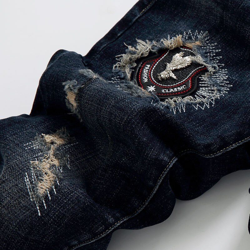 Pantalones vaqueros elásticos ajustados para hombre, Jeans rasgados desgastados negros con remaches, Jeans ajustados de Hip Hop para club nocturno