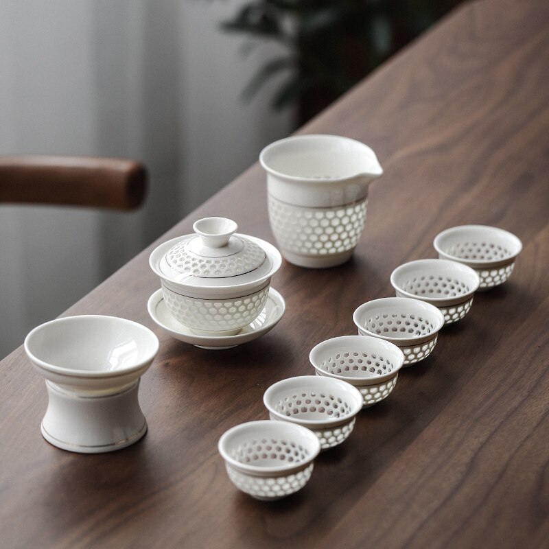A set of white porcelain Tea set tea set home hollow hollow cellling tea set a whole set of household ceramic tea set: Default Title