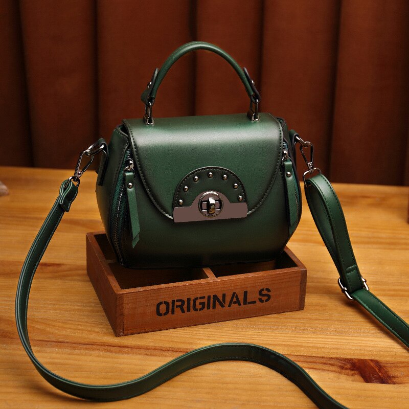 Yiyi's Women's bag factory Retro portable one shoulder diagonal bag rivet saddle bag: Dark Green