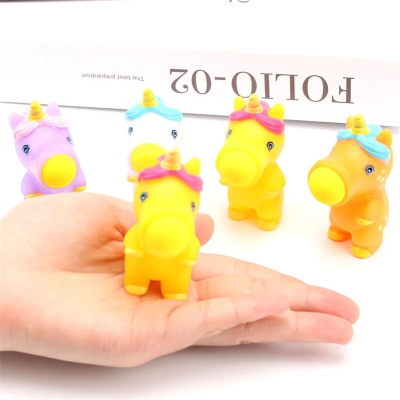 Juguetes creativos de unicornio para niños, catapulta, bola giratoria, orificios de descompresión, bolas para apretar, Juguetes Divertidos