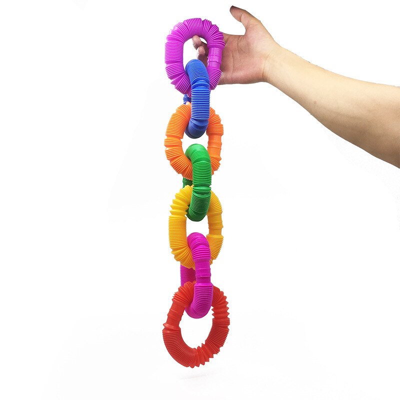 3 pezzi di plastica colorata Pop Tube Coil creativo magico giocattolo cerchio giocattoli divertenti sviluppo precoce educativo giocattolo pieghevole