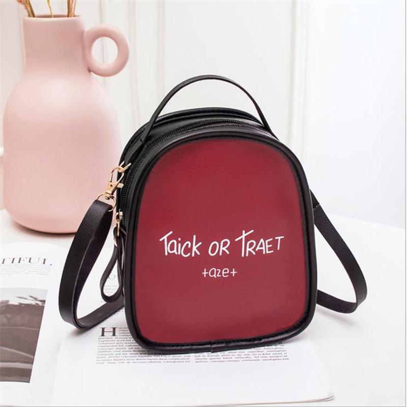 Versión coreana de color que hace juego letra impresa pequeña mochila producto slung hombro bolso