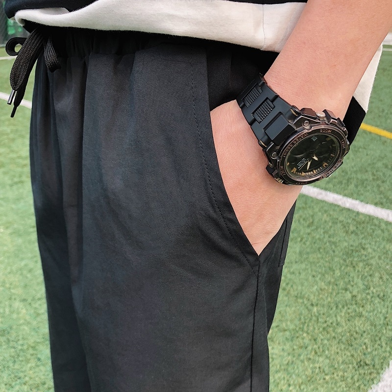 Męskie spodnie długości łydki spodnie z szerokimi nogawkami luźne rekreacyjne męskie koreańskie stylowe solidne cienkie oddychające retro Harajuku modny szyk Ulzzang