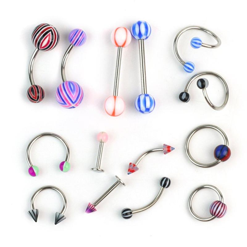 Et sæt  of 100 stk assorteret akryl tunge læbe labret navle mave øjenbryn ringe barbell piercing smykker (tilfældig farve)