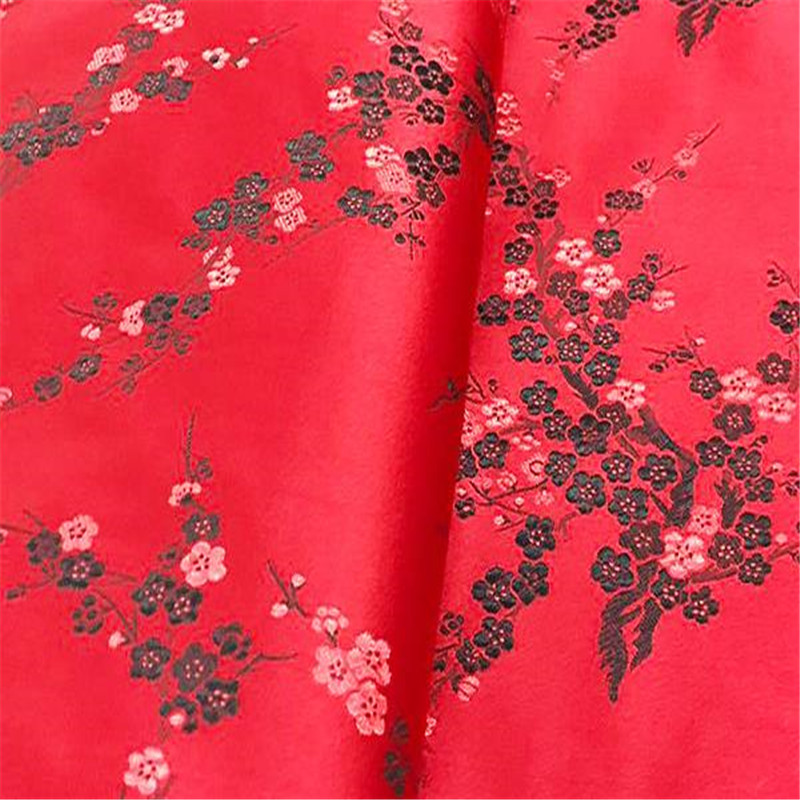 Jacquard polyesterstoffer vintersød blomme blomstermønster brokadestoffer til yndefulde kjoler: 3 rød sort