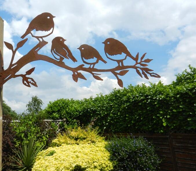 Rusty robin on a branch metal robin family wall decor fence decor