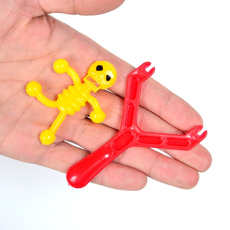 5pcs Novelty Gags & Practical Joke Toys Funny Rubber skeleton Stretchy launch Flying toys
