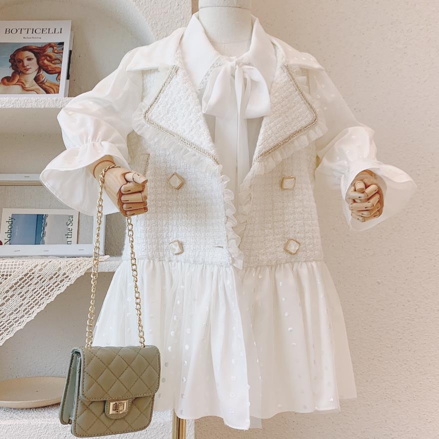 Kinderjasje van kleine tweedwol, herfstjas met dubbele mesh stiksels en middellange lengte