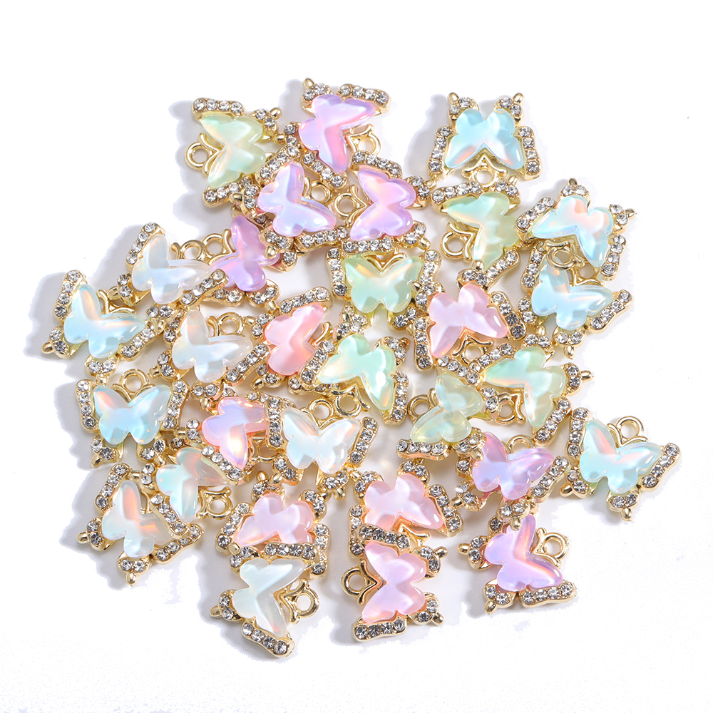 10 Uds. De abalorios de mariposa de cristal Multicolor de 11mm, colgante pequeño de cristal, manualidades, pendientes, collar, accesorios de decoración de joyería: Chapado en zinc blanco y azul