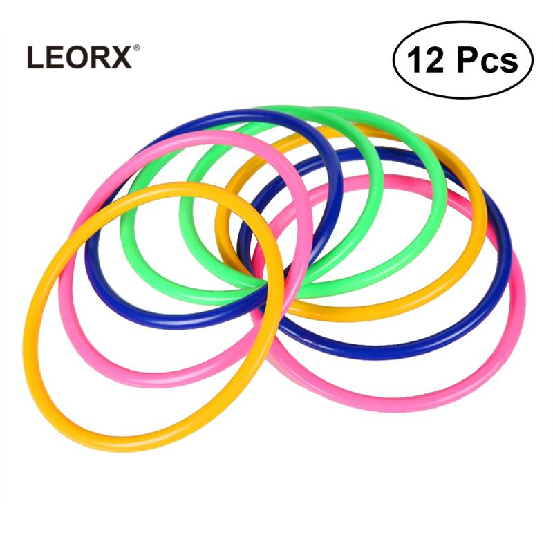 12pcs Plastic Toss Rings Kids Ring Toss Game for Carnival Garden Backyard Outdoor Games (Random Color) 8cm