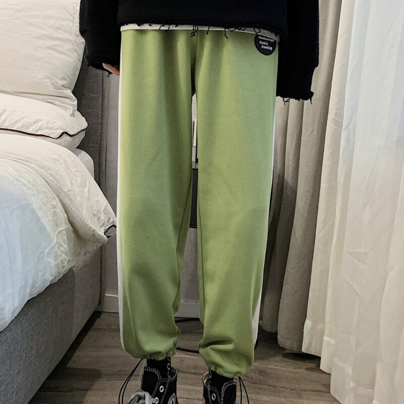 Verkkarit miesten hittivärit rento lenkkeilyhousut miesten katuvaatteet villi löysät hip hop suorat housut miesten verryttelyhousut