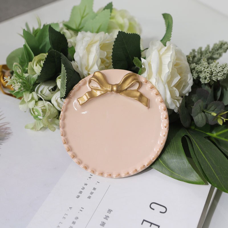 Kreative Harz Platte SchöNe retro Gold Überzogene Bogen-knoten aufbringen Nachtisch Obst Kuchen Platten Lagerung Tabletts Hause Dekoration 1Stck: Neu Rosa runden