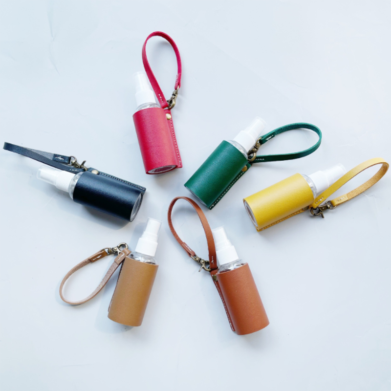 LLavero de Gel hidroalcohólico, funda desinfectante de manos, minibotella de Gel hidroalcohólico portátil, Funda de cuero, llavero de salud, 1 ud.