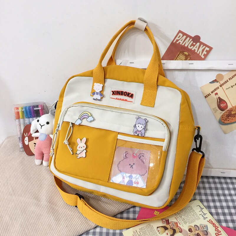 Mochila pequeña de nailon impermeable para mujer, bolso escolar bonito para chicas adolescentes, morral de viaje, mochila para estudiantes: Amarillo / With pendant