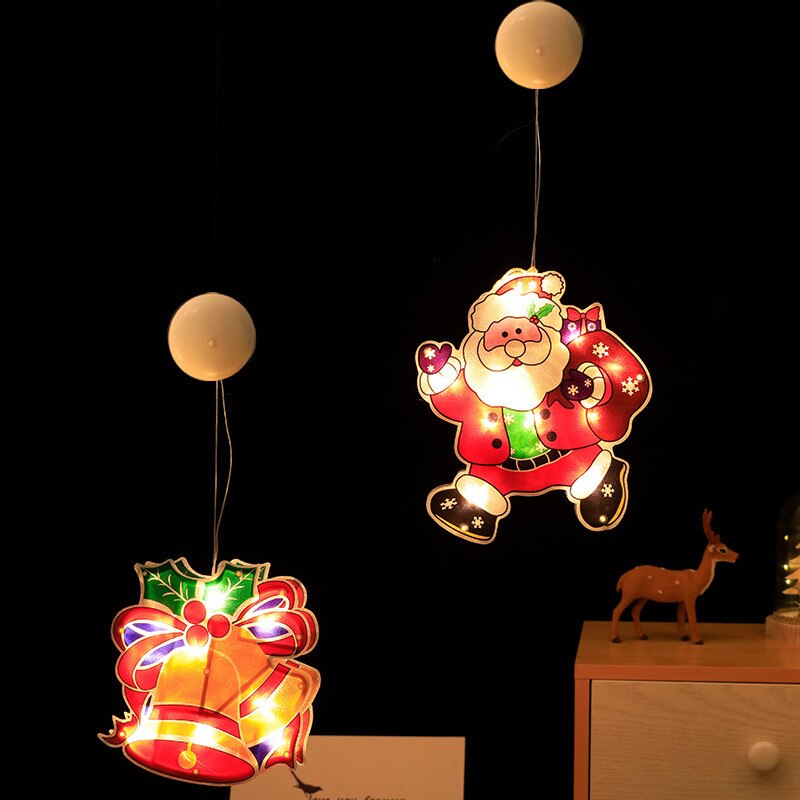 Kerstkamer glazen raam versierd met sterrenverlichting, lamp met zuignap, gekleurde lamp, hanglamp, kerstman sfeerdecoratie
