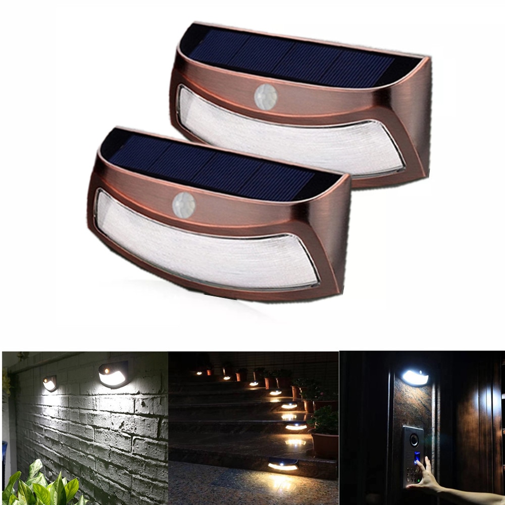 1/2PCS 8 LED Solar Power PIR Motion Sensor Smiley Light Outdoor Waterproof Copper Security Light For Garden Fence Path Wall lamp