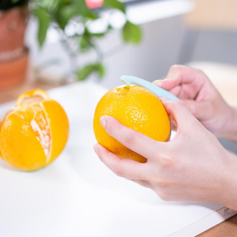 Sitrushedelmät appelsiini sitrushedelmien kuoriimet innovatiivinen hedelmä muovi höyläystyökalu avoin greippi artefakti leikkaus hedelmät keittiö vempain