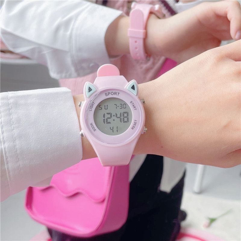 【Reloj + pulsera】Conjunto de pulsera electrónica de unicornio deportivo multifuncional de silicona con oreja de gato para niños: Rosa