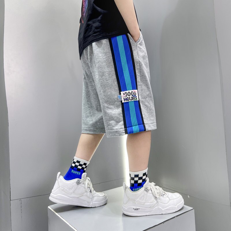 Pantaloncini per ragazzi di grandi dimensioni pantaloni sportivi allentati in cotone Casual per adolescenti estivi abbigliamento per bambini pantaloni a righe laterali in vita elastica 5-14 anni