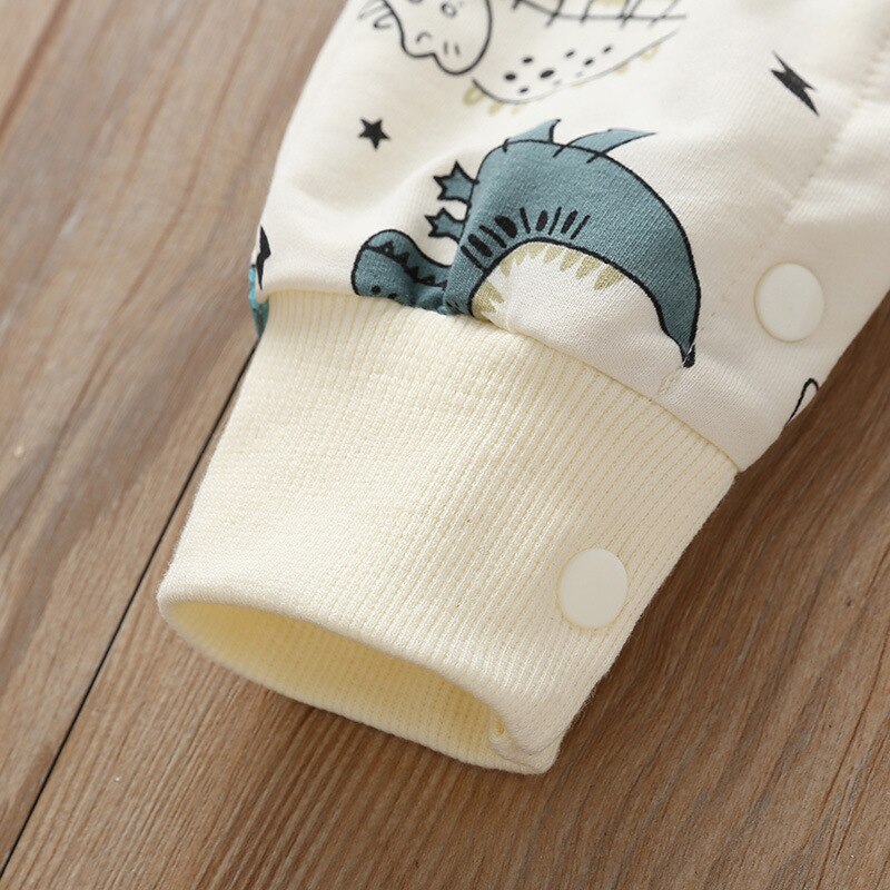 Carter niño pequeño primavera y otoño bebé niño y niña dibujos animados dinosaurio mono de manga larga