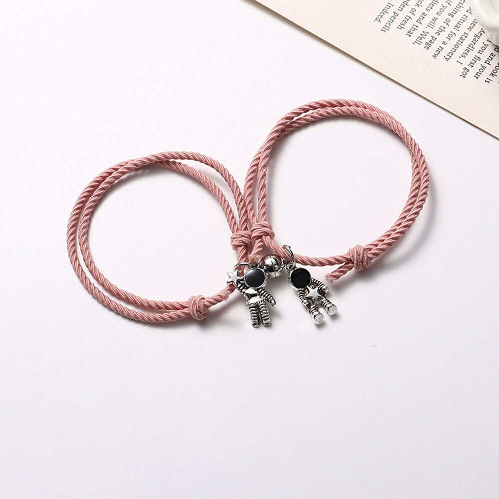 Pulsera de pareja astronauta pequeña banda de Goma para enviar novia novio imán piedra brazalete con cascabel nudo de la cuerda de la joyería: Pink