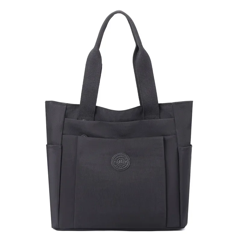 Sac décontracté pour femmes, à la et décontracté, nouvel article 2024, sac mère à main en tissu nylon solide de grande capacité à bandoulière unique: Marron