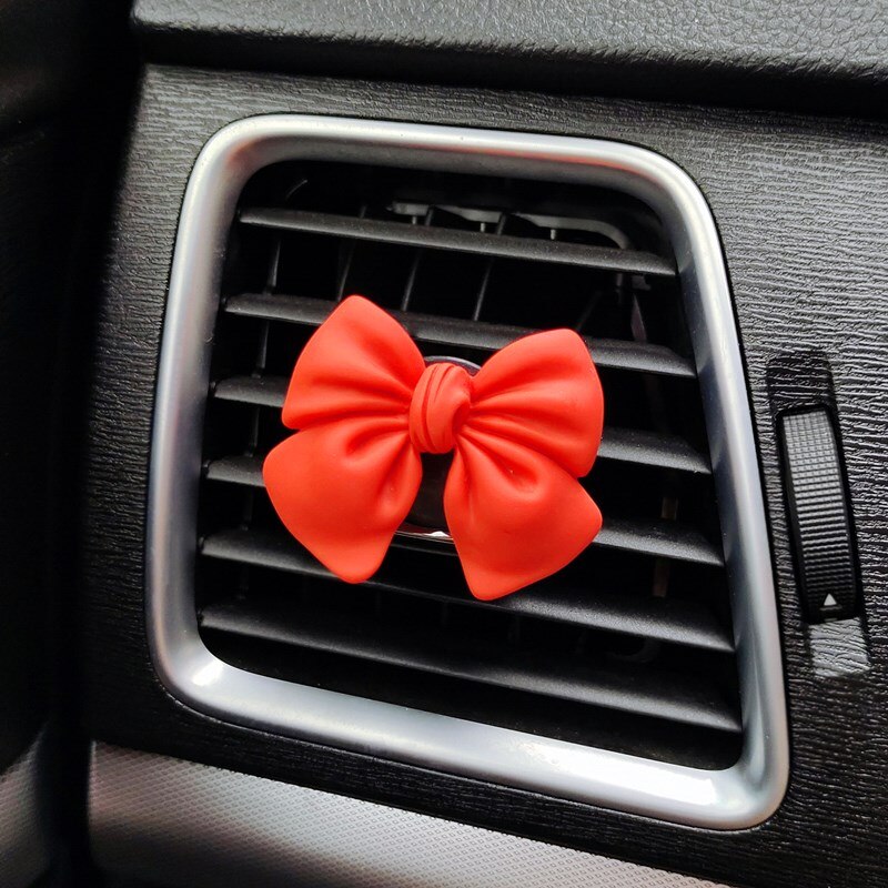 Cute Bow-knot Car Accessories Interior Woman Perfume Clip Car Air Freshener Air Vent Clip Cartoon Bow-knot Girls Decoration: Orange