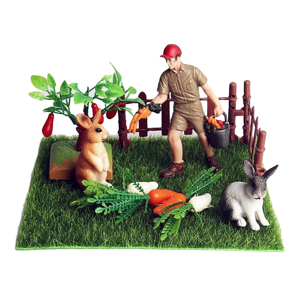 Miniatur-mikrolandschaftsdekoration mit kaninchen und karotten (nahaufnahme)