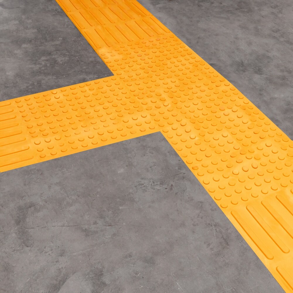 PrimeMatik - Baldosa podotáctil pavimento táctil de ciegos invidentes de 30x30cm con franjas amarillo 10-pack
