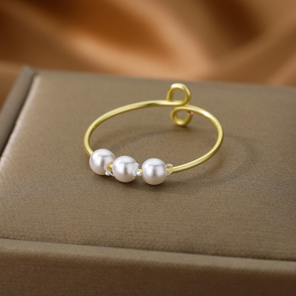 Anillo giratorio de perlas de imitación para chica y mujer, anillo antiestrés, giratoria libre, para ansiedad