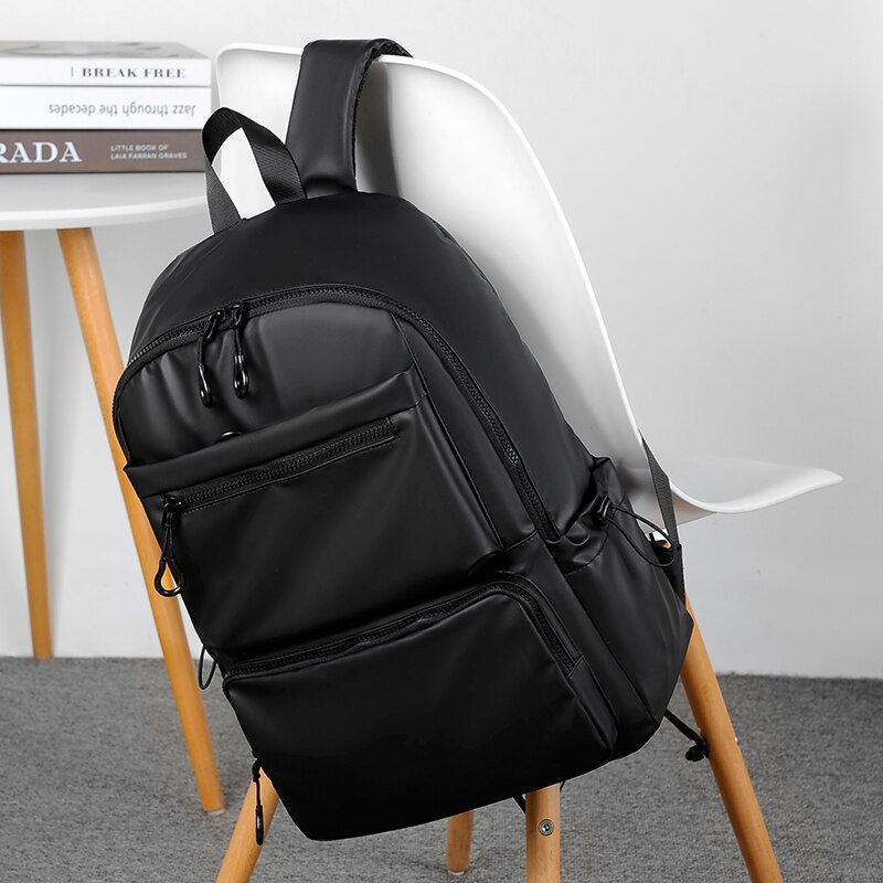 A 14 Inch Men's Backpack Large Capacity Travel Leisure Solid Color Pu Computer Backpack Men And Women Students Schoolbag